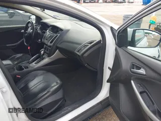 2013 Ford Focus SE with VIN 1FADP3F24DL302263, listed as a IAAI auction lot 42672666 with 207,805 mi miles and . Bid and sale history available at DreamBid. Image 5.