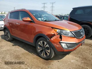 2011 Kia Sportage SX with VIN KNDPC3A63B7169255, listed as a Copart auction lot 60174855 with 121,236 mi miles and Salvage title. Bid and sale history available at DreamBid. Image 4.
