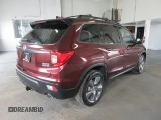 2020 Honda Passport Touring z VIN 5FNYF8H9XLB002041, wystawiony jako Copart lot #78496434 z przebiegiem 39 475 mil mil oraz Szkoda całkowita • Salvage title. Historia ofert i sprzedaży dostępna na DreamBid. Obrazek 3.
