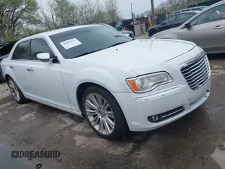 2011 Chrysler 300 with VIN 2C3CA6CT7BH579512, listed as a IAAI auction lot 41939227 with 140,733 mi miles. Bid and sale history available at carsss.com. Image 1.