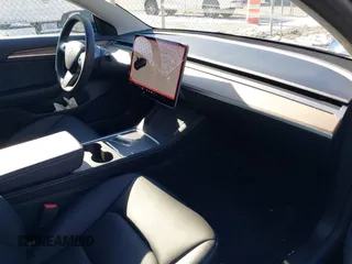2021 Tesla Model 3 Performance with VIN 5YJ3E1EC5MF090518, listed as a IAAI auction lot 38775658 with 14,118 mi miles and . Bid and sale history available at carsss.com. Image 5.