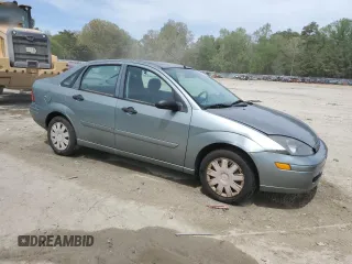 2004 Ford Focus SE z VIN 1FAFP34384W130421, wystawiony jako Copart lot #54045255 z przebiegiem 172 319 mil mil oraz Szkoda całkowita • Salvage title. Historia ofert i sprzedaży dostępna na DreamBid. Obrazek 4.