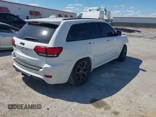 2020 Jeep Grand Cherokee Trackhawk with VIN 1C4RJFN96LC141513, listed as a IAAI auction lot 42386219 with Not provided miles and . Bid and sale history available at DreamBid. Image 4.