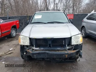 2005 GMC Envoy SLE with VIN 1GKDT13S552332088, listed as a IAAI auction lot 41699178 with 196,869 mi miles. Bid and sale history available at carsss.com. Image 6.