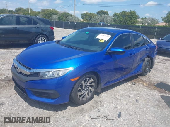 2018 Honda Civic EX with VIN 19XFC2F72JE036055, listed as a IAAI auction lot 41960037 with 128,650 mi miles and . Bid and sale history available at DreamBid. Image 17.