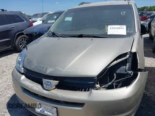 2005 Toyota Sienna CE with VIN 5TDZA23C15S227689, listed as a IAAI auction lot 42020894 with 307,314 mi miles and . Bid and sale history available at DreamBid. Image 13.