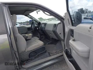 2007 Ford F-150 STX with VIN 1FTRX14W97FB49702, listed as a IAAI auction lot 41566306 with 236,003 mi miles. Bid and sale history available at carsss.com. Image 5.