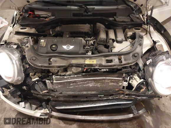 2013 MINI Roadster with VIN WMWSY1C52DT625564, listed as a IAAI auction lot 41442864 with 98,240 mi miles and . Bid and sale history available at DreamBid. Image 10.