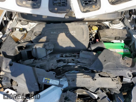 2016 Jeep Cherokee Latitude with VIN 1C4PJLCB8GW125748, listed as a Copart auction lot 60697145 with 118,276 mi miles and Salvage title. Bid and sale history available at DreamBid. Image 12.