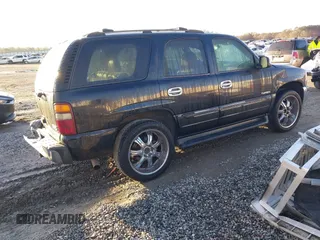 2002 GMC Yukon SLT with VIN 1GKEC13Z42J245768, listed as a IAAI auction lot 41769081 with 389,189 mi miles. Bid and sale history available at carsss.com. Image 4.