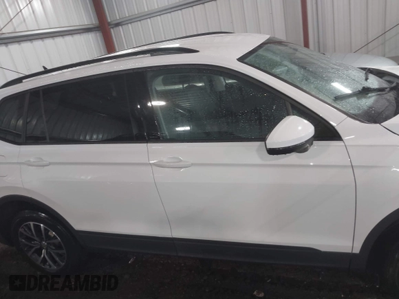 2021 Volkswagen Tiguan S z VIN 3VV1B7AX6MM081755, wystawiony jako IAAI lot #41864918 z przebiegiem 40 406 mil mil oraz . Historia ofert i sprzedaży dostępna na DreamBid. Obrazek 13.