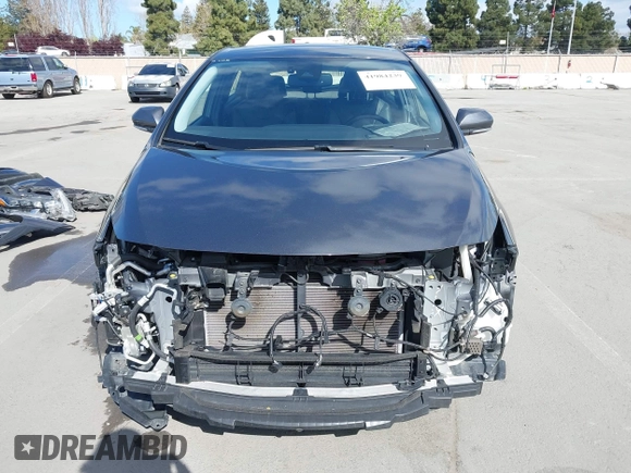 2022 Toyota Prius LE with VIN JTDKAMFP7N3206830, listed as a IAAI auction lot 41984239 with 57,681 mi miles and . Bid and sale history available at DreamBid. Image 12.