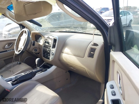 2006 Mercury Mariner Luxury with VIN 4M2CU57186DJ07953, listed as a IAAI auction lot 41756840 with 163,988 mi miles. Bid and sale history available at carsss.com. Image 5.