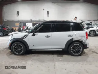 2016 MINI Countryman S with VIN WMWZC5C57GWU20085, listed as a IAAI auction lot 42403406 with 90,592 mi miles and . Bid and sale history available at DreamBid. Image 15.