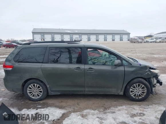 2012 Toyota Sienna XLE AAS with VIN 5TDYK3DCXCS206978, listed as a IAAI auction lot 41374061 with 307,827 mi miles and . Bid and sale history available at DreamBid. Image 14.