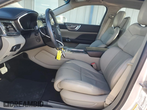 2017 Lincoln Continental Reserve z VIN 1LN6L9RP9H5629658, wystawiony jako Copart lot #58175245 z przebiegiem 91 197 mil mil oraz Szkoda całkowita • Salvage title. Historia ofert i sprzedaży dostępna na DreamBid. Obrazek 7.