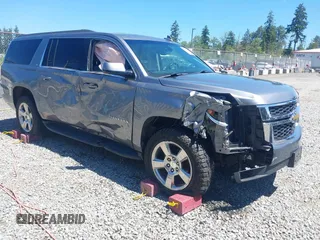 2019 Chevrolet Suburban LT z VIN 1GNSKHKC9KR179184, wystawiony jako IAAI lot #42372731 z przebiegiem 73 661 mil mil oraz . Historia ofert i sprzedaży dostępna na DreamBid. Obrazek 1.