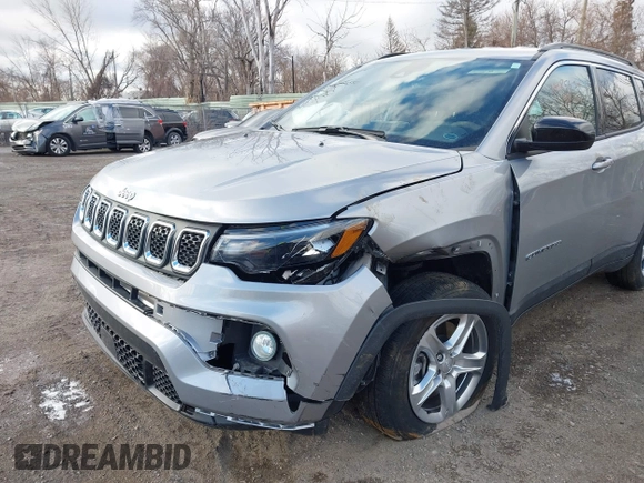 2023 Jeep Compass Latitude with VIN 3C4NJDBN7PT532099, listed as a IAAI auction lot 41485624 with 10,564 mi miles and . Bid and sale history available at DreamBid. Image 6.