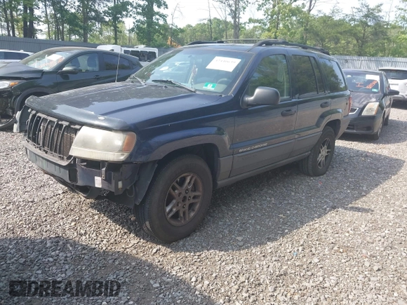 2004 Jeep Grand Cherokee Laredo with VIN 1J4GW48NX4C405558, listed as a IAAI auction lot 42440639 with 197,457 mi miles and . Bid and sale history available at DreamBid. Image 2.