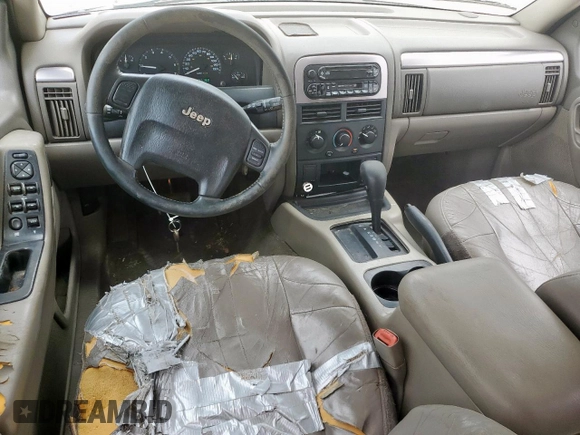 2003 Jeep Grand Cherokee Laredo with VIN 1J4GX48S13C609036, listed as a Copart auction lot 63143505 with 127,188 mi miles and Clean title. Bid and sale history available at DreamBid. Image 8.