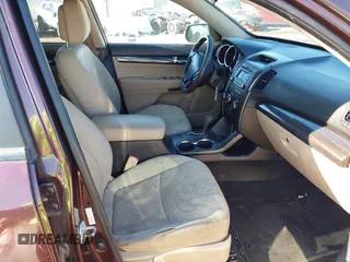 2013 Kia Sorento LX with VIN 5XYKT3A17DG375103, listed as a IAAI auction lot 42327291 with 228,761 mi miles and . Bid and sale history available at DreamBid. Image 5.