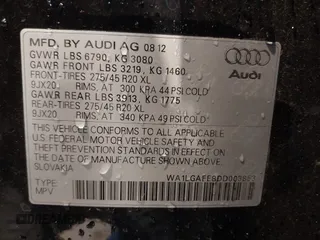 2013 Audi Q7 3.0T Premium Plus with VIN WA1LGAFE8DD003853, listed as a IAAI auction lot 40675011 with 104,517 mi miles. Bid and sale history available at carsss.com. Image 9.