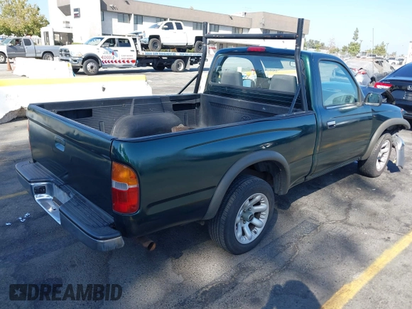 1999 Toyota Tacoma with VIN 4TANL42N7XZ481489, listed as a IAAI auction lot 40365153 with 218,971 mi miles. Bid and sale history available at carsss.com. Image 4.