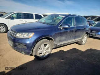 2012 Volkswagen Touareg Sport z VIN WVGFK9BP9CD000509, wystawiony jako Copart lot #48507095 z przebiegiem 164 283 mil mil oraz Szkoda całkowita • Salvage title. Historia ofert i sprzedaży dostępna na DreamBid. Obrazek 1.