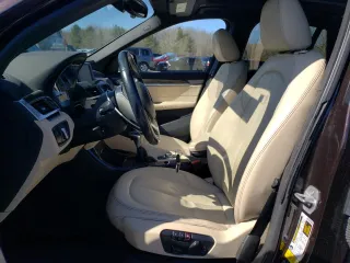 2016 BMW X1 xDrive28i z VIN WBXHT3C3XGP888701, wystawiony jako Copart lot #51409205 z przebiegiem 94 713 mil mil oraz Szkoda całkowita • Salvage title. Historia ofert i sprzedaży dostępna na DreamBid. Obrazek 7.