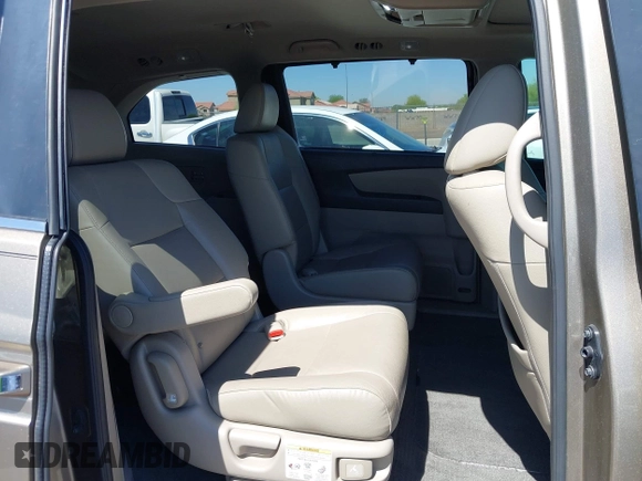 2012 Honda Odyssey EX-L z VIN 5FNRL5H63CB033049, wystawiony jako IAAI lot #42260501 z przebiegiem 165 693 mil mil oraz . Historia ofert i sprzedaży dostępna na DreamBid. Obrazek 8.
