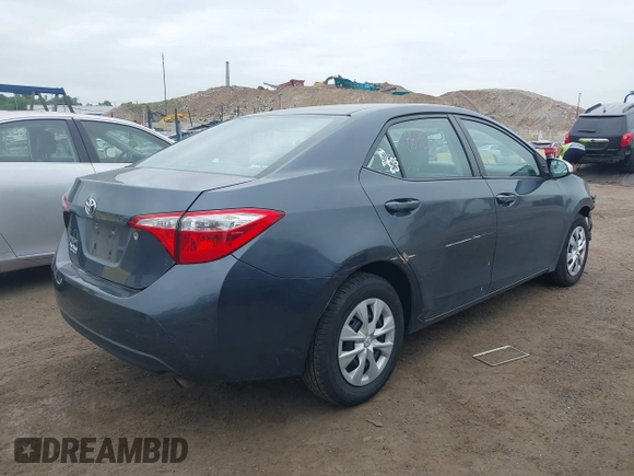 2014 Toyota Corolla L with VIN 2T1BURHE5EC027497, listed as a IAAI auction lot 42602880 with 101,094 mi miles and . Bid and sale history available at DreamBid. Image 4.