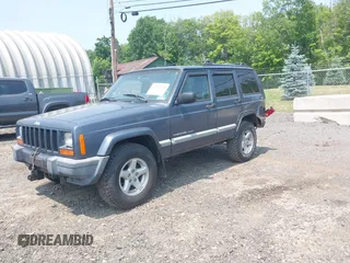 2001 Jeep Cherokee Sport z VIN 1J4FF48S51L531033, wystawiony jako IAAI lot #42423910 z przebiegiem 90 438 mil mil oraz . Historia ofert i sprzedaży dostępna na DreamBid. Obrazek 2.