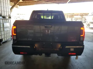 2020 Honda Ridgeline RTL-E z VIN 5FPYK3F74LB004391, wystawiony jako Copart lot #50100715 z przebiegiem 27 076 mil mil oraz Szkoda całkowita • Salvage title. Historia ofert i sprzedaży dostępna na DreamBid. Obrazek 6.