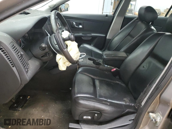 2007 Cadillac CTS with VIN 1G6DM57T970152651, listed as a Copart auction lot 65904654 with 0 mi miles and Salvage Title. Bid and sale history available at carsss.com. Image 7.