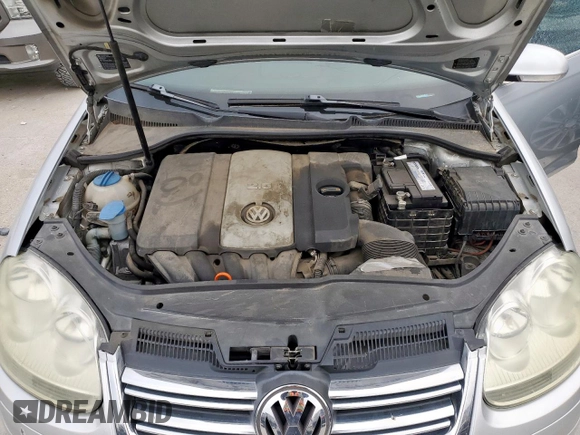 2008 Volkswagen Jetta SE z VIN 3VWRM71K98M063043, wystawiony jako Copart lot #50171755 z przebiegiem 151 740 mil mil oraz Szkoda całkowita • Salvage title. Historia ofert i sprzedaży dostępna na DreamBid. Obrazek 11.