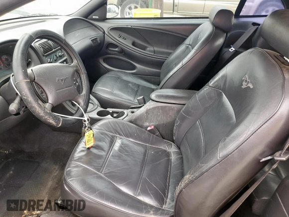 2000 Ford Mustang with VIN 1FAFP444XYF251973, listed as a Copart auction lot 58192815 with 114,531 mi miles and Salvage title. Bid and sale history available at DreamBid. Image 7.
