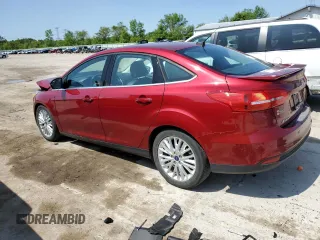 2017 Ford Focus Titanium with VIN 1FADP3J28HL209081, listed as a Copart auction lot 59171635 with 120,201 mi miles and Salvage title. Bid and sale history available at DreamBid. Image 2.