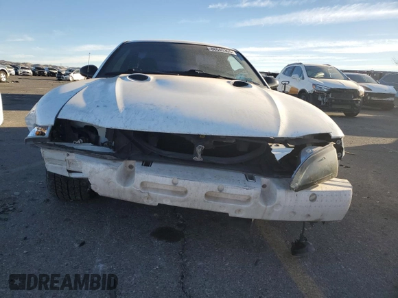 1997 Ford Mustang Cobra with VIN 1FALP47VXVF139807, listed as a Copart auction lot 88045305 with 113,571 mi miles and Salvage Title. Bid and sale history available at carsss.com. Image 5.