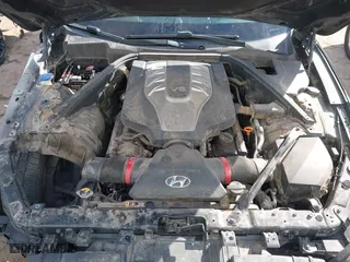 2015 Hyundai Genesis 5.0L with VIN KMHGN4JF5FU027850, listed as a IAAI auction lot 41634248 with 122,999 mi miles. Bid and sale history available at carsss.com. Image 10.