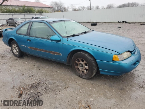 1994 Ford Thunderbird LX with VIN 1FALP6243RH223519, listed as a Copart auction lot 80962814 with 125,016 mi miles and Salvage Title. Bid and sale history available at DreamBid. Image 4.