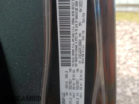 2015 Jeep Wrangler Unlimited Freedom with VIN 1C4BJWDG4FL568601, listed as a Copart auction lot 64041415 with 128,874 mi miles and Salvage title. Bid and sale history available at DreamBid. Image 13.