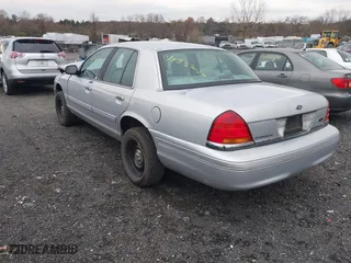 2003 Ford Crown Victoria LX with VIN 2FAFP74W53X151974, listed as a IAAI auction lot 40887020 with 186,149 mi miles. Bid and sale history available at carsss.com. Image 3.