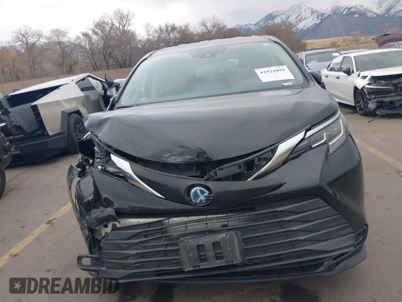 2022 Toyota Sienna LE z VIN 5TDKSKFC1NS042455, wystawiony jako IAAI lot #41921094 z przebiegiem 84 810 mil mil oraz . Historia ofert i sprzedaży dostępna na DreamBid. Obrazek 12.