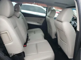 2015 Mazda CX-9 Grand Touring z VIN JM3TB2DA0F0468350, wystawiony jako Copart lot #61545095 z przebiegiem 154 050 mil mil oraz Szkoda całkowita • Salvage title. Historia ofert i sprzedaży dostępna na DreamBid. Obrazek 11.