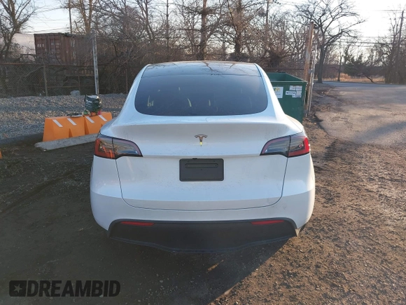 2024 Tesla Model Y с VIN 7SAYGDED5RF010087, выставлен на аукционе IAAI как лот 41312466 с пробегом Не указан миль и . История ставок и продаж доступна на DreamBid. Изображение 16.