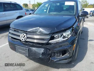 2015 Volkswagen Tiguan SE with VIN WVGAV7AX5FW509612, listed as a IAAI auction lot 42020599 with 64,201 mi miles and . Bid and sale history available at DreamBid. Image 6.