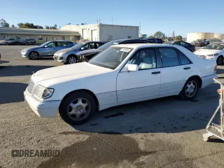1995 Mercedes-Benz S 320 with VIN WDBGA32E8SA252144, listed as a Copart auction lot 77053484 with 126,534 mi miles and Clean Title. Bid and sale history available at DreamBid. Image 1.