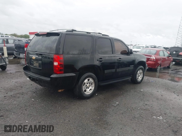 2013 Chevrolet Tahoe LS with VIN 1GNSCAE07DR223062, listed as a IAAI auction lot 41948276 with 196,616 mi miles and . Bid and sale history available at DreamBid. Image 4.