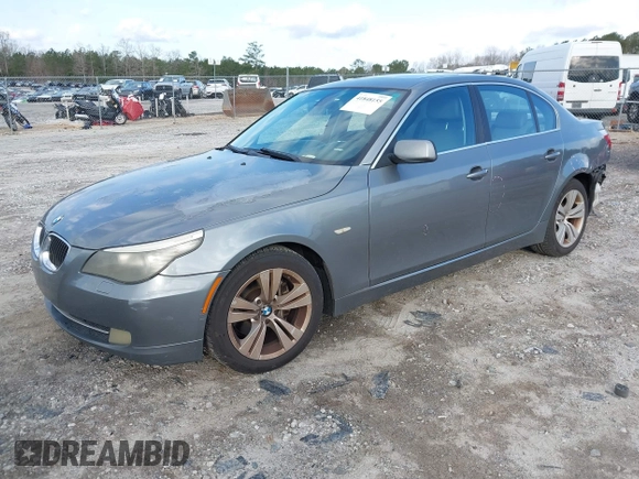 2010 BMW 5 Series 528i with VIN WBANU5C5XAC124594, listed as a IAAI auction lot 41848155 with 182,845 mi miles and . Bid and sale history available at carsss.com. Image 2.