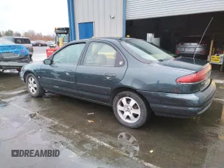 1998 Mercury Mystique z VIN 1MEFM66L5WK667211, wystawiony jako Copart lot #82342784 z przebiegiem 94 102 mil mil oraz Tytuł czysty. Historia ofert i sprzedaży dostępna na DreamBid. Obrazek 2.
